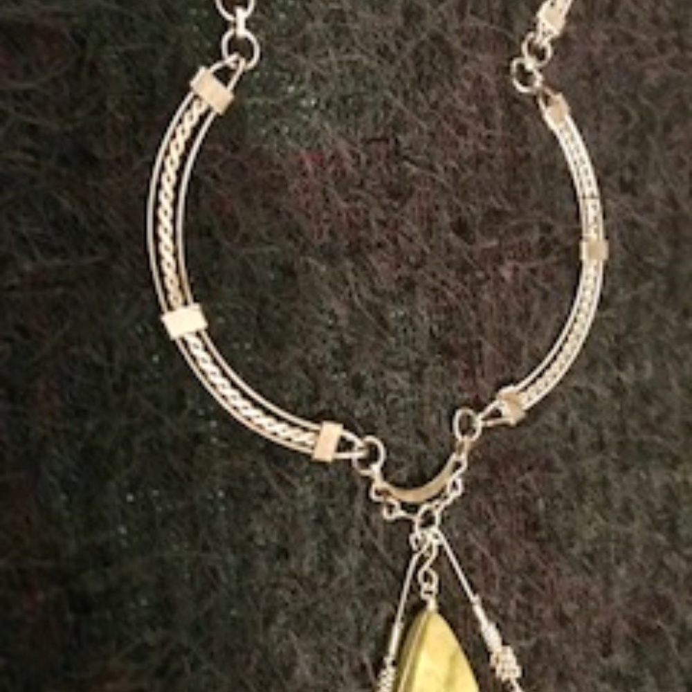 Beautiful silver tone tribal necklace with stone